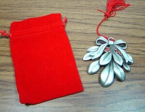 AVON PEWTER ORNAMENT-MISTLETOE WITH RED RHINESTONE ACCENTS-2010-RED VELVET BAG